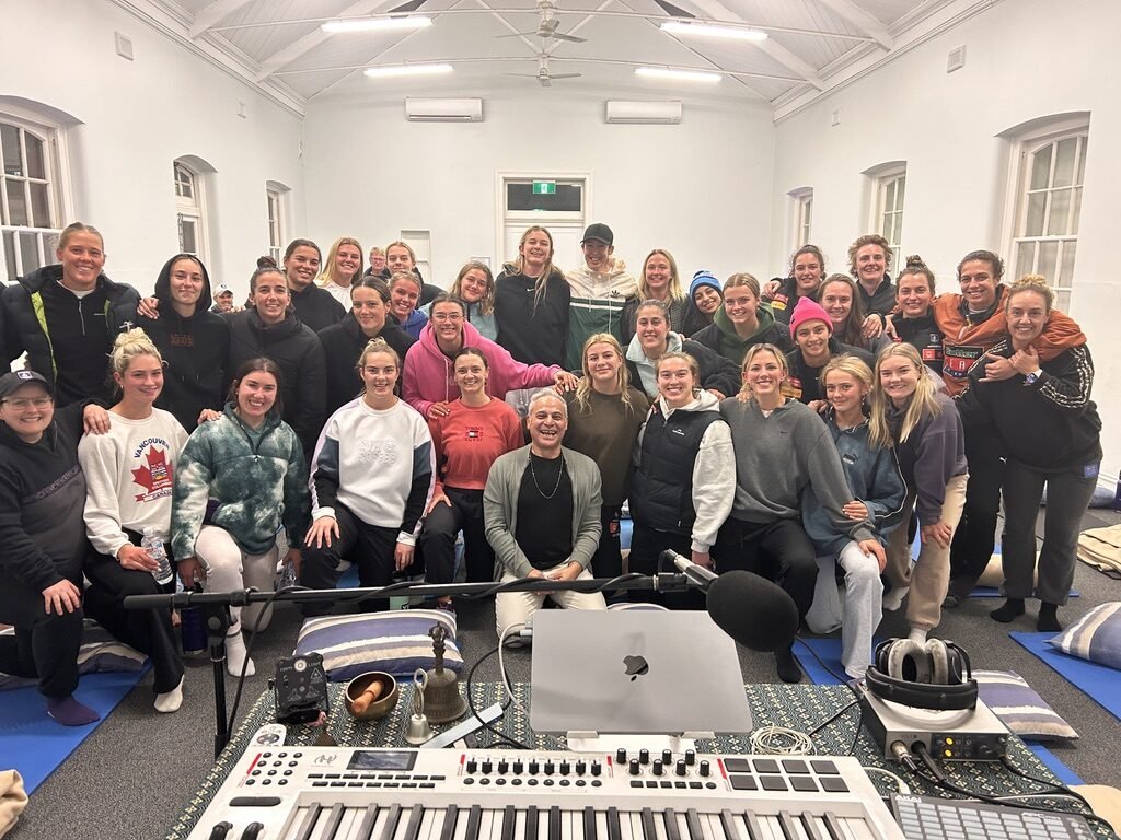 Sam Cutri with Fremantle Dockers AFLW players following a group Soundful Experience